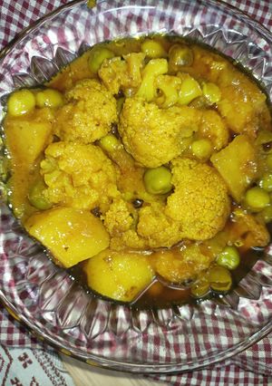 A picture of Aloo Gobi Matar (Potato, Cauliflower, and Pea Curry).
