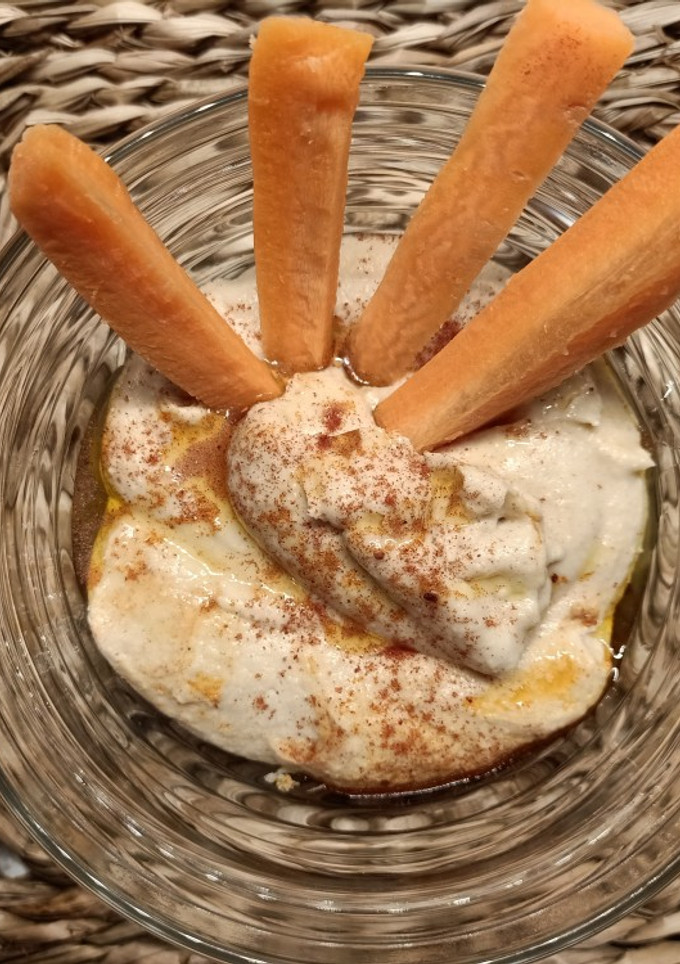 Una foto de Hummus de garbanzos y alubias