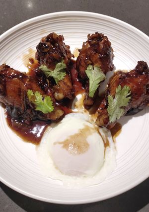 A picture of Coke Chicken with Poached Egg.
