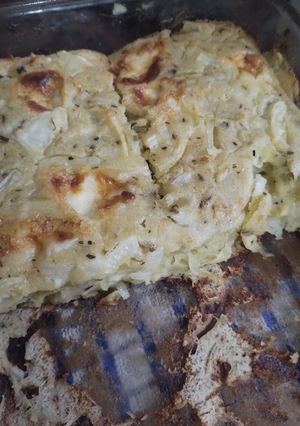 Una foto de Torta de cebolla y queso