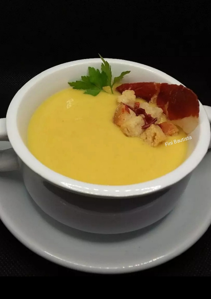Una foto de Crema de pimientos amarillo