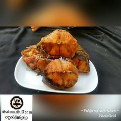 A picture of Fried cat fish by salma.s.Adam (ful@rny"ss kitchen).