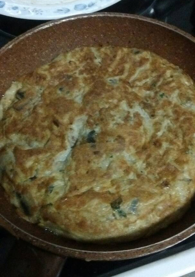 Una foto de Tortilla de champiñones