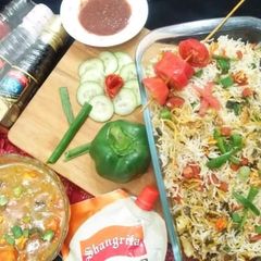 A picture of Fried chicken rice with chicken 🍗 chilli.