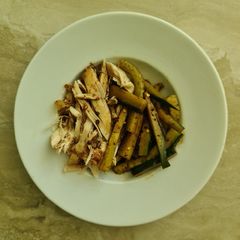 Shredded chicken with cucumber salad A picture of Shredded chicken with cucumber salad.