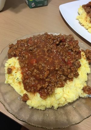 Una foto de Polenta con tuco