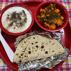 Masala aalu,cucumber carrot raita with plain roti (simple Lunch) A picture of Masala aalu,cucumber carrot raita with plain roti (simple Lunch).