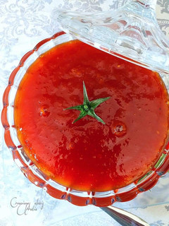 Una foto de Confitura de tomates baby en rama con toques de clementinas
