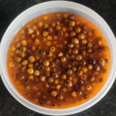 A picture of Green peppercorn pickle.