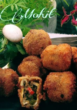 A picture of Cheese stuffed mushrooms.
