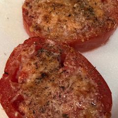 A picture of Broiled fresh garlic parm tomatoes.