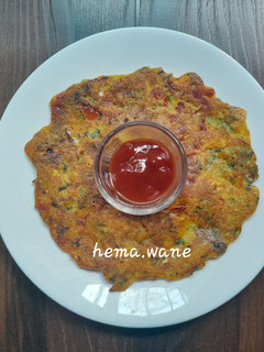 A picture of Moong dal cabbege uttapa.