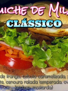 Una foto de Sándwich de Milanesa Completo estilo Argentino