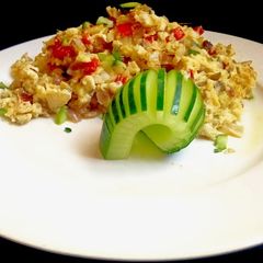 A picture of Scrambled egg with Cucumber.