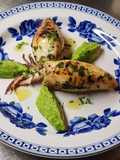 Calamari ripieni di scampi e zucchine