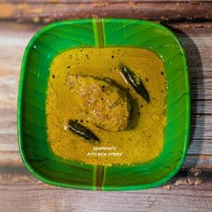 A picture of Shorshe Ilish (Hilsa Fish cooked in mustard gravy).