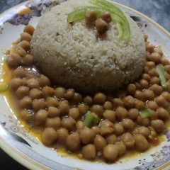 Zeera rice with chana salan😊 A picture of Zeera rice with chana salan😊.