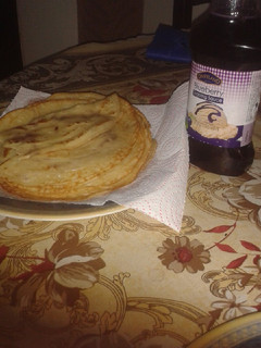 A picture of Pancake with blueberry sauce.