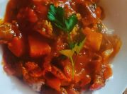 Una foto de bondiola de cerdo y arroz