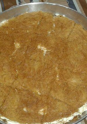 A picture of Knafeh with Cream.