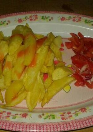 A picture of Chips and kachumbari.
