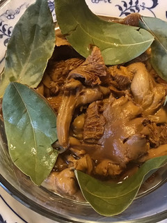 A picture of California Farm Pickled Chanterelle Mushrooms.