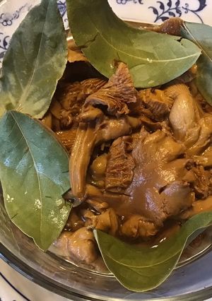 A picture of California Farm Pickled Chanterelle Mushrooms.