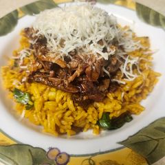 A picture of Brad's crockpot Caribbean jerk pork ribs with turmeric rice.
