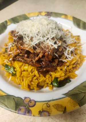 A picture of Brad's crockpot Caribbean jerk pork ribs with turmeric rice.
