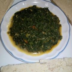 A picture of Pumpkin leaves in coconut cream.