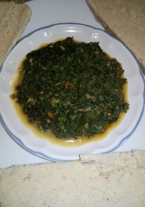 A picture of Pumpkin leaves in coconut cream.