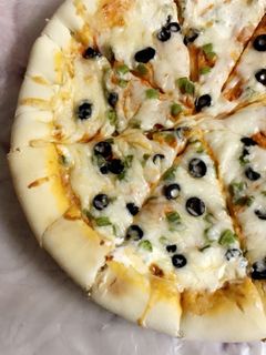 صورة لوصفة بيتزا 🍽