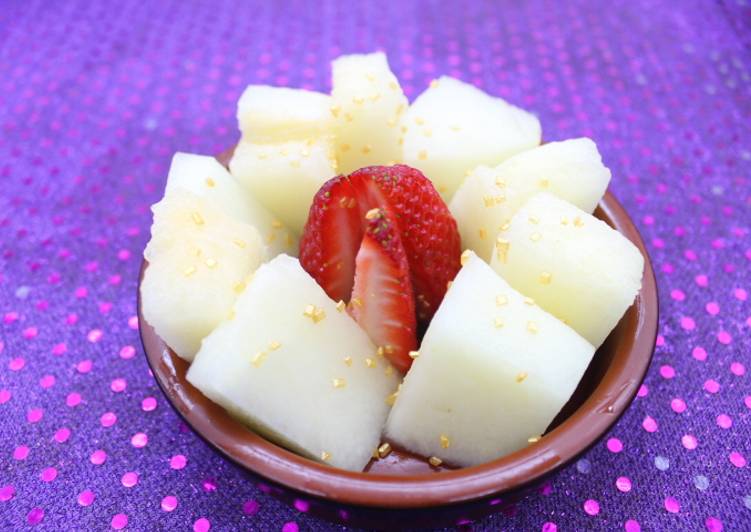 Melón con fresón y oro