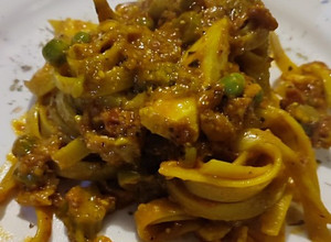 Una foto de Fettuccine con tocineta y huevo