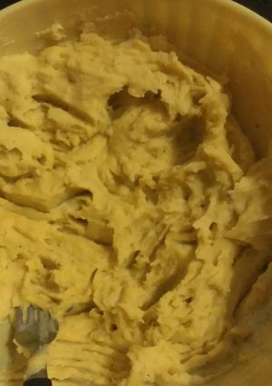 Una foto de Puré de papas y batatas y queso cheddar