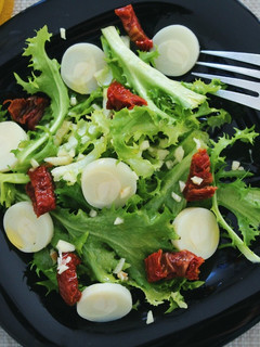 Una foto de Ensalada de escarola y palmito