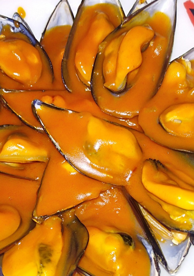 Una foto de Mejillones en salsa