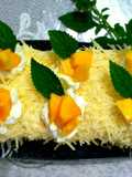 Bolu vanilla toping keju dan mangga