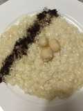 Risotto al prosecco di Valdobbiadene con capesante e polvere di caffè