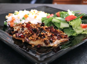 Una foto de Filete de pescado al ajillo