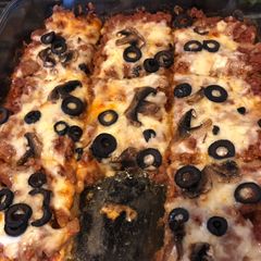 A picture of Pizza bake with zucchini crust.