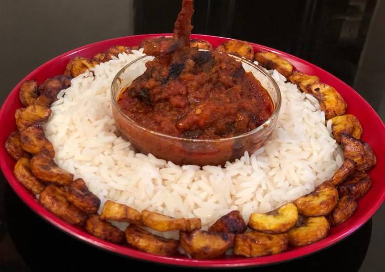 Rice, assorted stew and plantain
