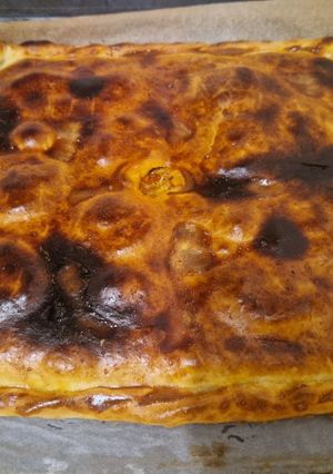 A picture of Tuna, Red Bell Pepper, Onion, and Hard-Boiled Egg Empanada.