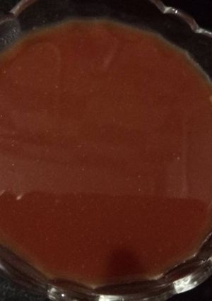 A picture of Tomato & tamarind chutney/sauce.