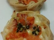 Una foto de canastita de caprese