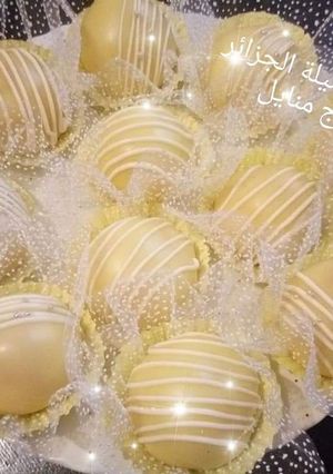 صورة لوصفة حلوة الليمون 🍋🍋 بحشوة جوز الهند 🍋🍋 بطلية ماكاش اطرى من