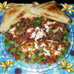 A picture of Water Poached Eggs with Spicy Masala.