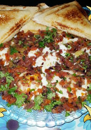 A picture of Water Poached Eggs with Spicy Masala.