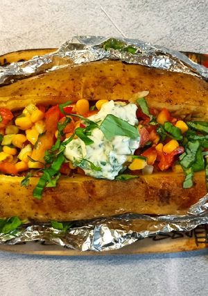 Una foto de Papa rellena de vegetales
