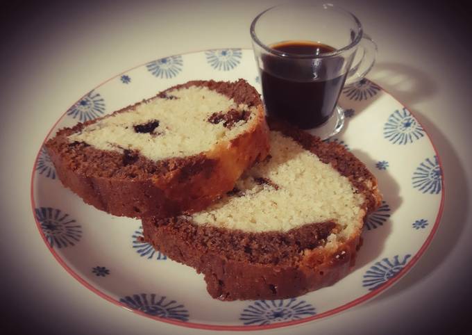 Comment faire Préparer Savoureux Cake bicolore aux pépites de chocolat
🍞